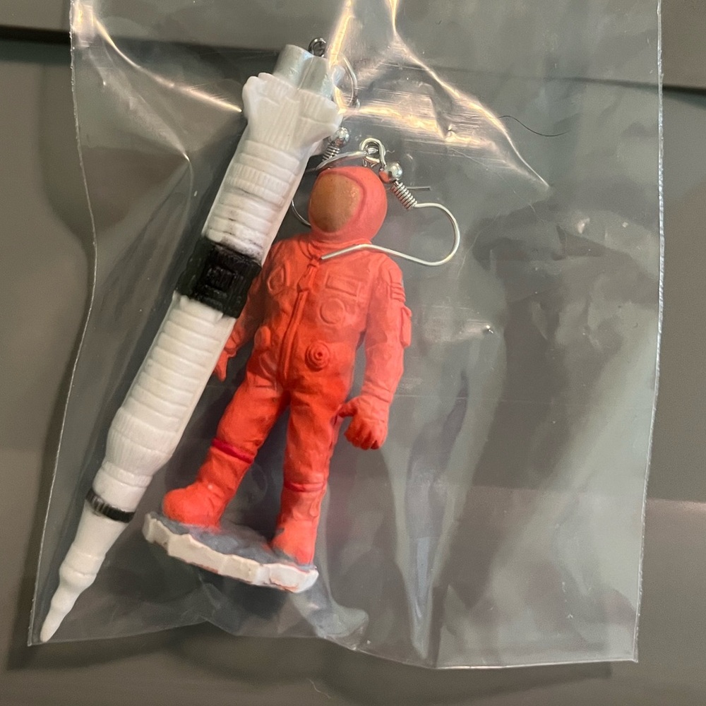 Handmade astronaut and shuttle earrings.